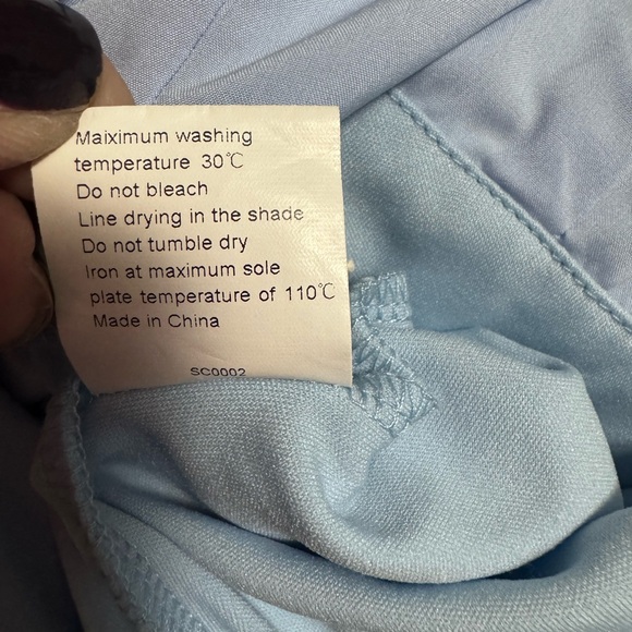 New Baby Blue open from shorts romper - Picture 9 of 13